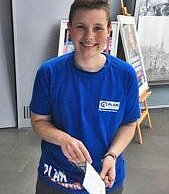 Luke bereitet den Infostand im Schokoladenmuseum vor