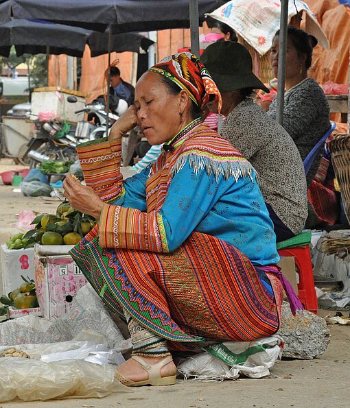 In den abgelegenen Gebirgsregionen Vietnams sind Kinderehen verbreitet Eine Nung-Frau in Ha Giang