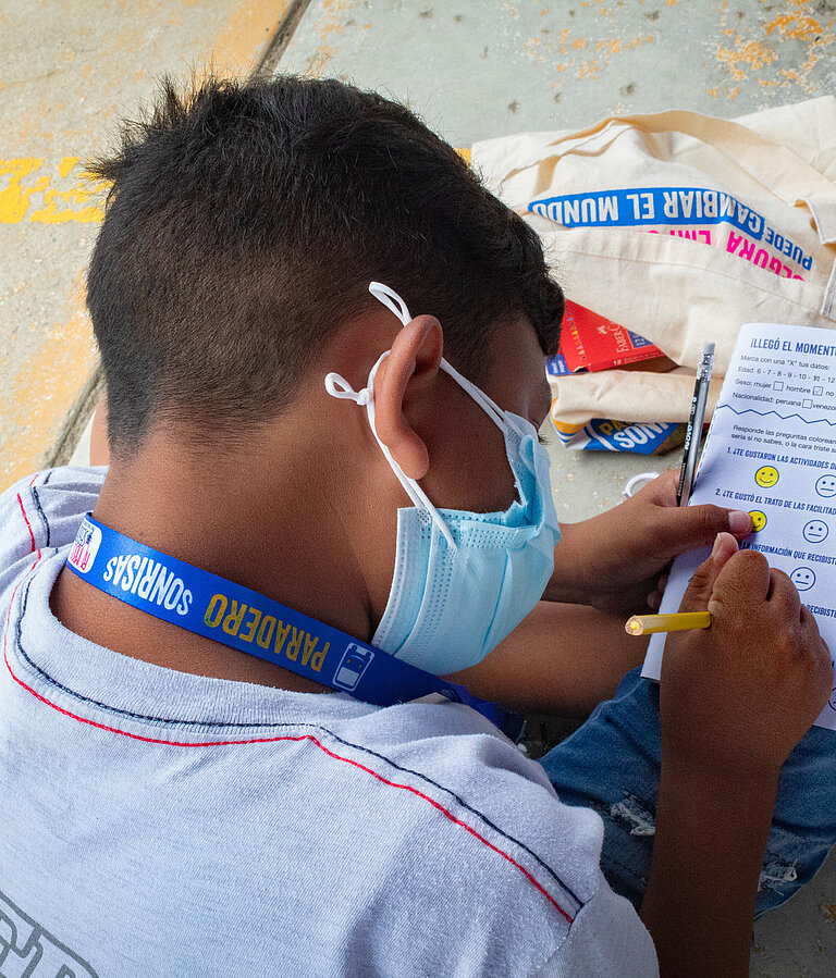 Ein Junge aus Venezuela im Plan-Schutzzentrum