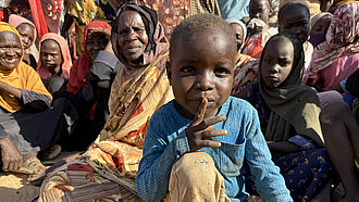 Porträt eines Kindes in einem Camp.