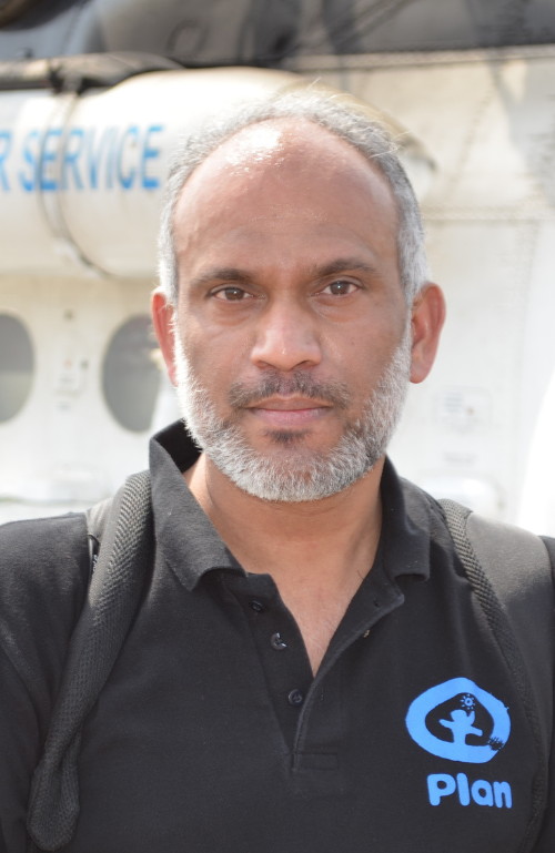 Dr. Unni Krishnan, globaler Leiter der Humanitären Hilfe bei Plan International. Portrait Dr. Unni Krishnan